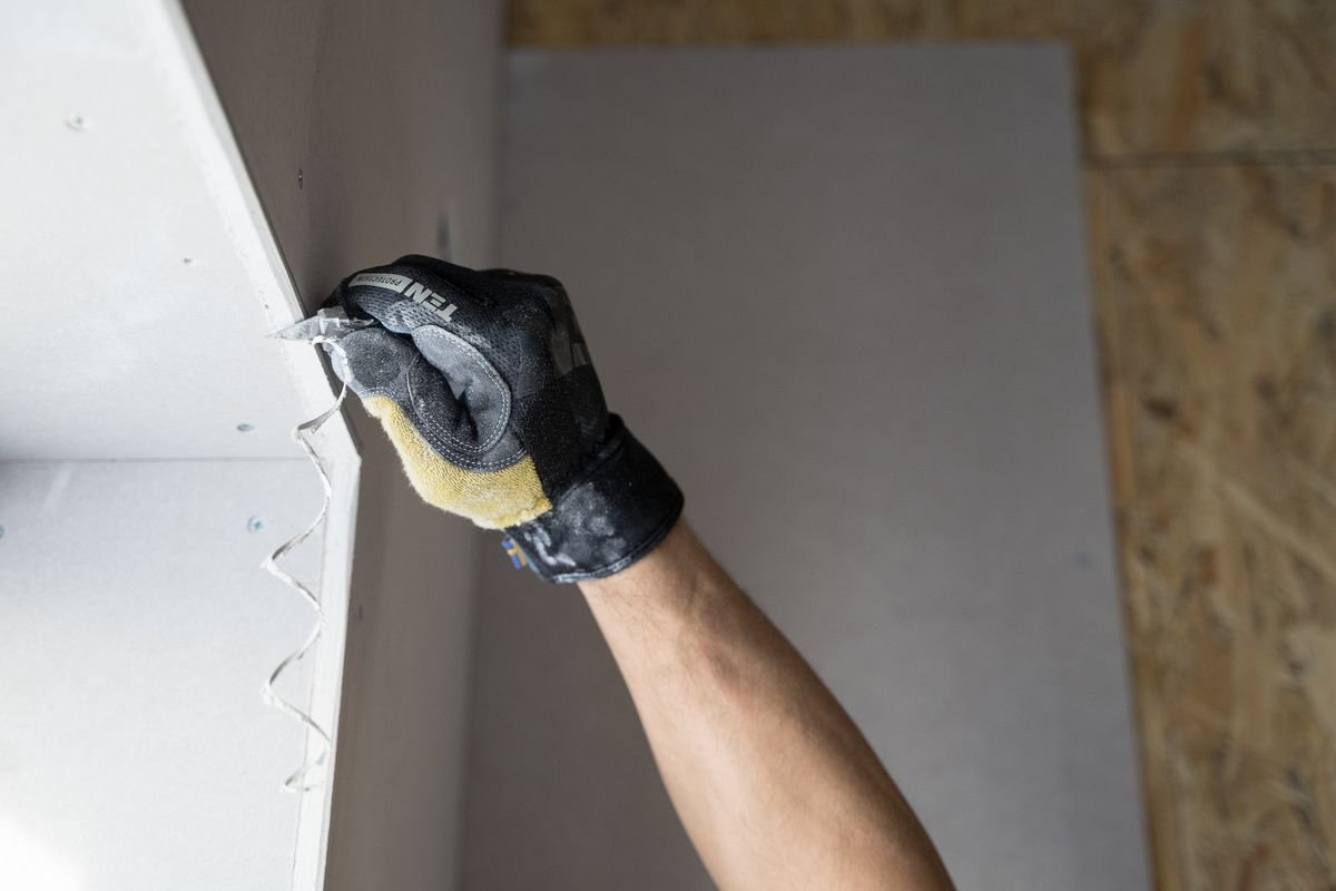Drywall being installed during a renovation