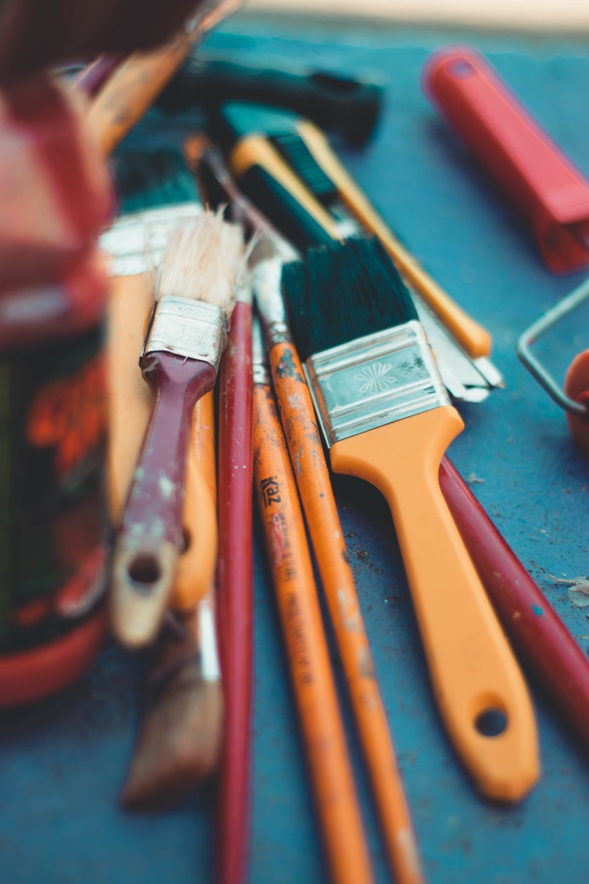 Paint brushes and decorating tools laid out