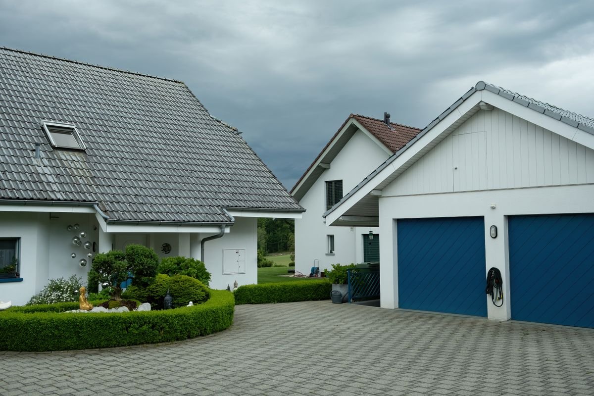 Residential driveway surface leading to a house