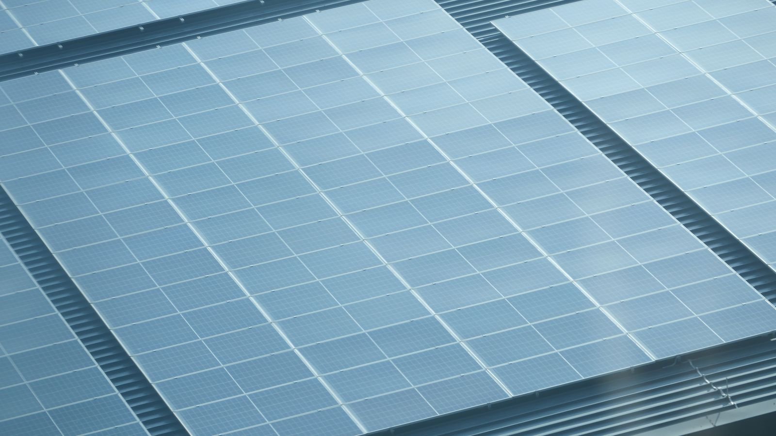 Close view of roof shingles and ridge line