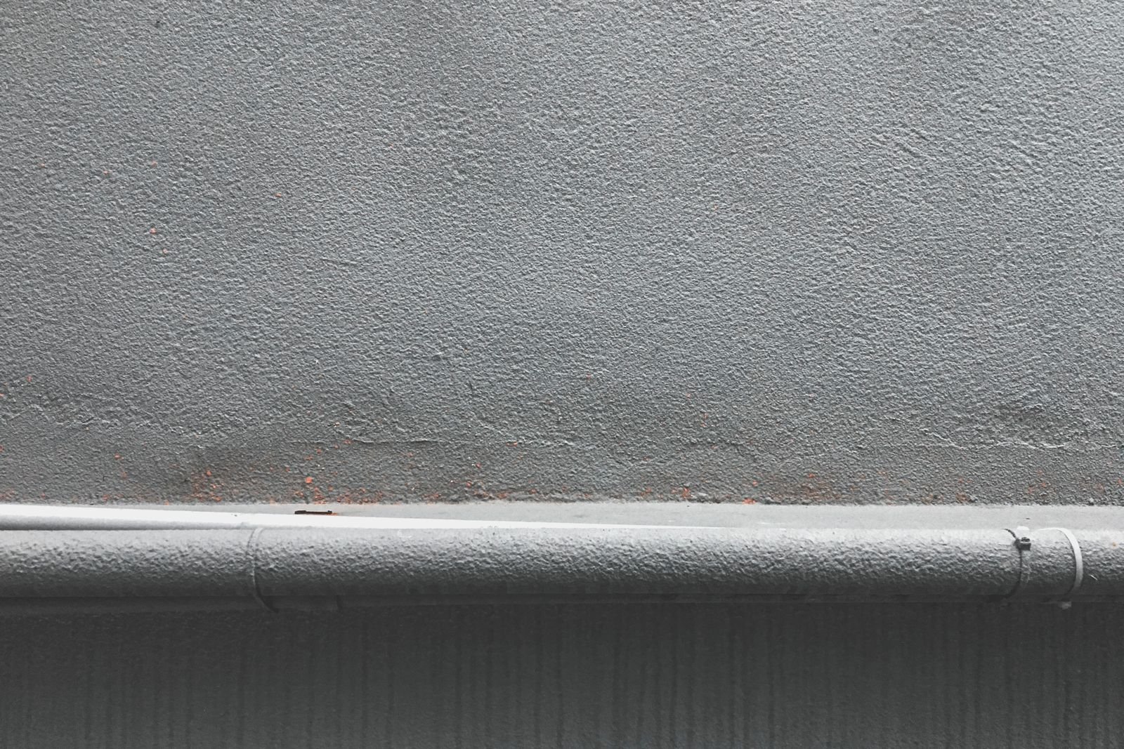 A close view of a concrete wall surface